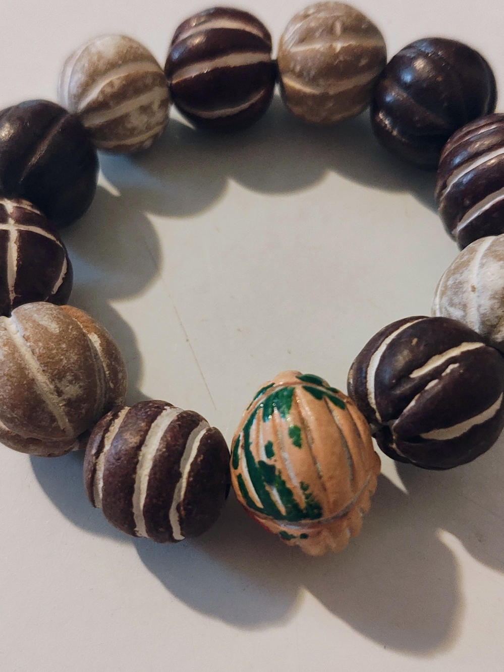 Carved Bead Stretch Bracelet in Brown, Tan & Green Accent
